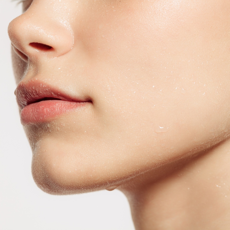 Face-building. Closeup female lips, cheeks and nose isolated over white studio background. Natural beauty. Concept of natural beauty, cosmetology, skincare, cosmetics, plastic surgery, ad