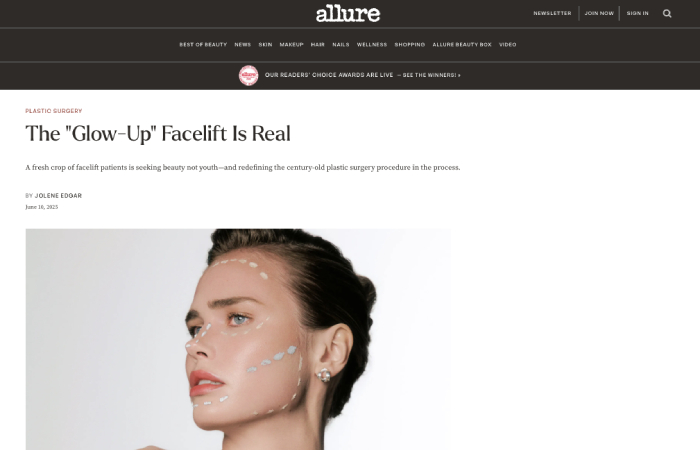 Screenshot from Allure article 'The Glow-Up Facelift Is Real' showing a woman with slicked-back hair and white cream dots and contour lines on her face, illustrating a facelift concept.